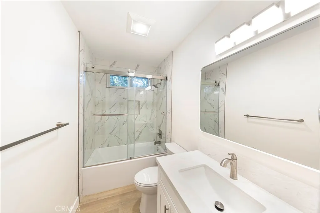 2477 Orange, Unit A Costa Mesa, CA 92626 - Photo 5 of 21 a bathroom with a sink mirror toilet and bathtub