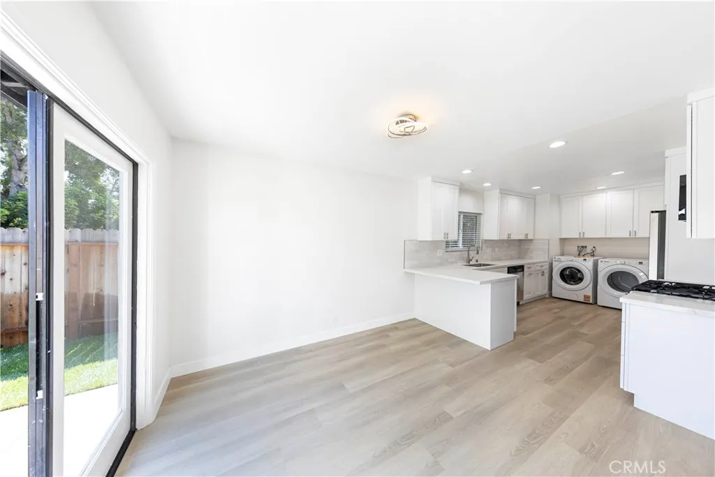2477 Orange, Unit A Costa Mesa, CA 92626 - Photo 6 of 21 a view of kitchen with wooden floor