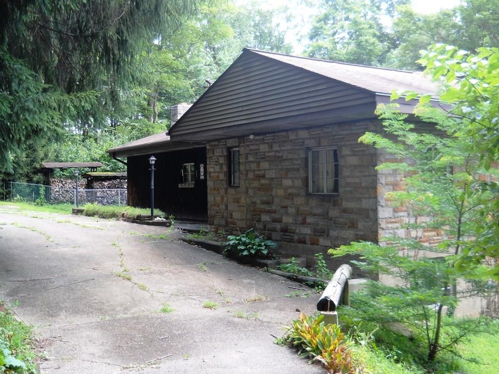 1 - Exterior Right Front - Governor driveway with two entrances to State Gamelands Road