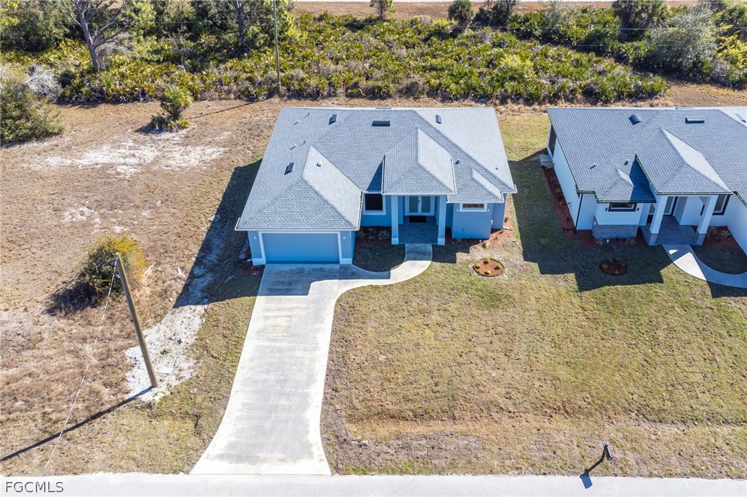 97 Brig Circle East Placida, FL 33946 - Photo 22 of 23 a aerial view of a house with a yard