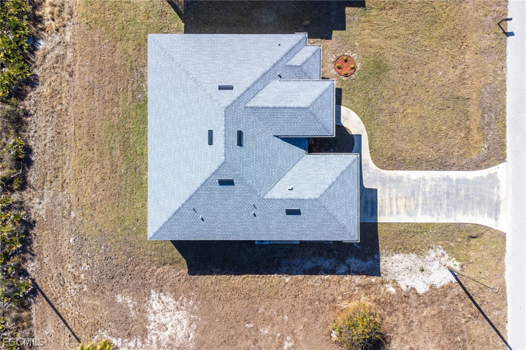 97 Brig Circle East Placida, FL 33946 - Photo 23 of 23 an aerial view of a house with a yard