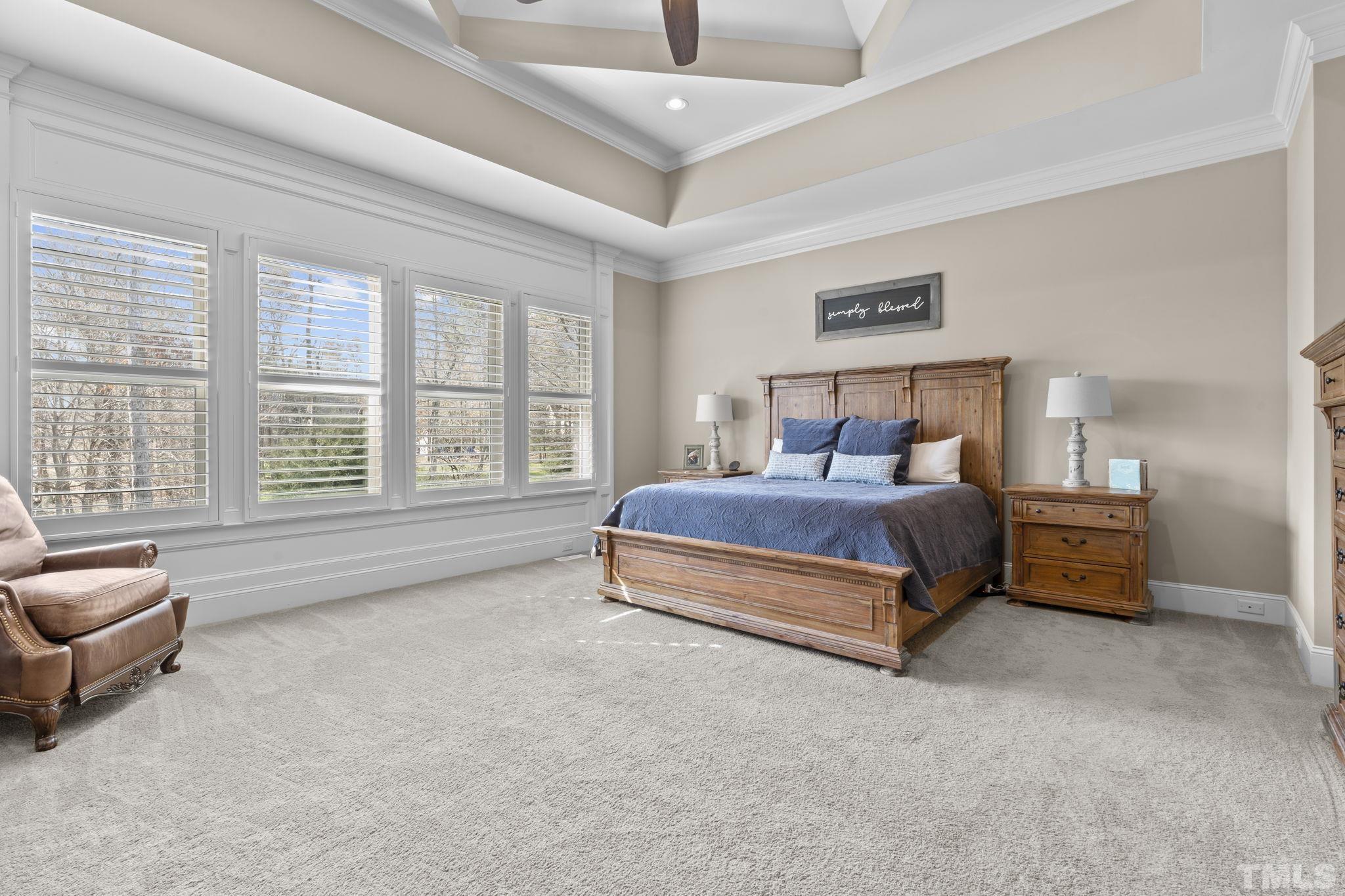 3976 Springfield Trail Wake Forest, NC 27587 - Photo 17 of 35 a bedroom with bed and balcony