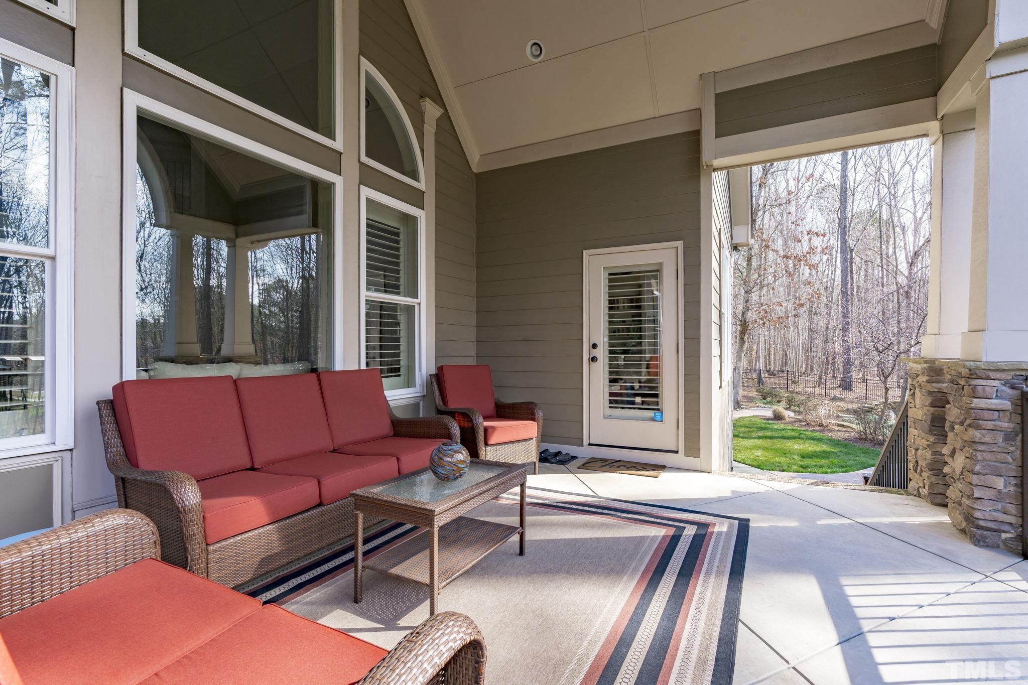 3976 Springfield Trail Wake Forest, NC 27587 - Photo 29 of 35 a living room with furniture and a yard