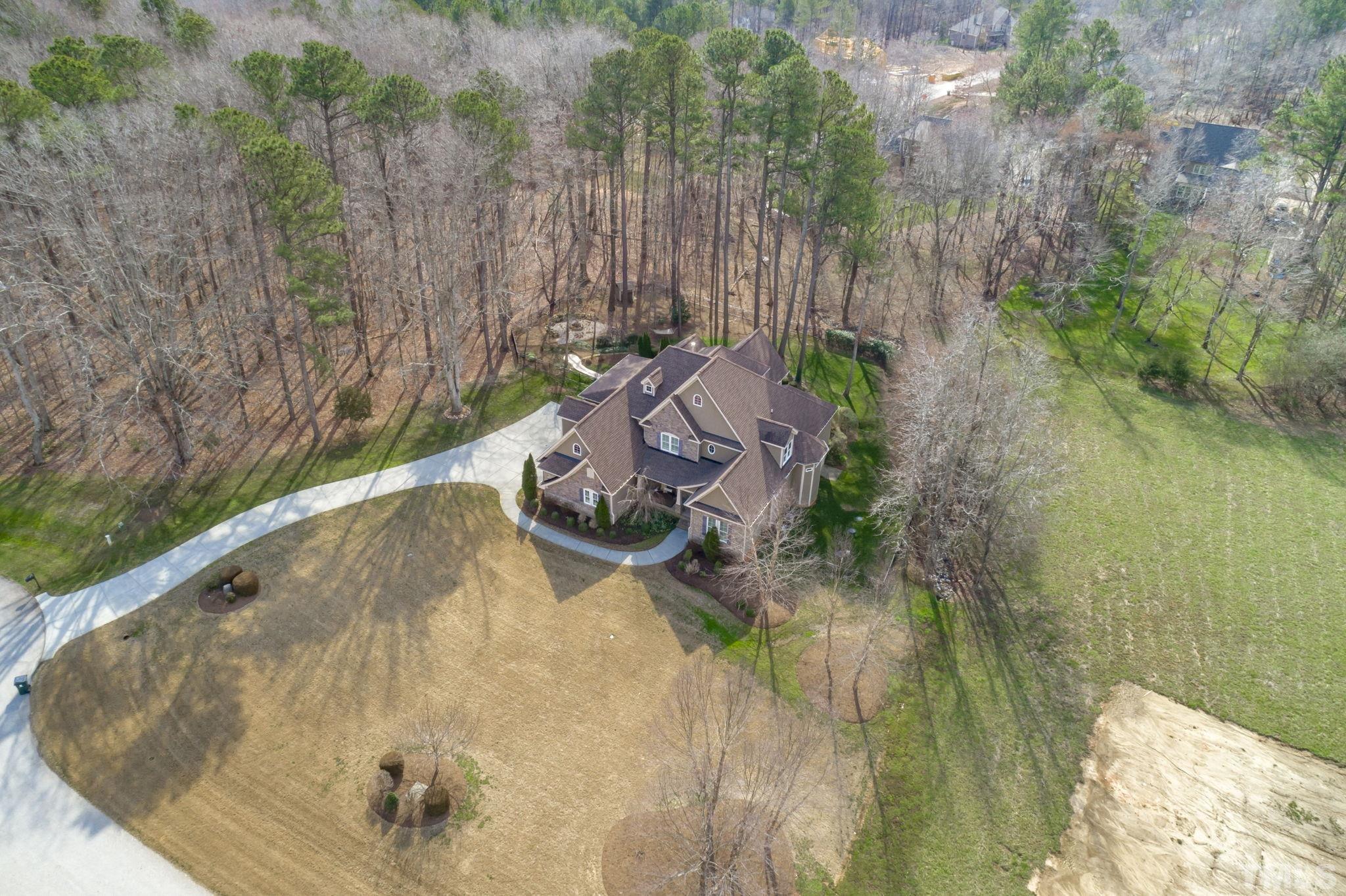 3976 Springfield Trail Wake Forest, NC 27587 - Photo 34 of 35 a view of a swimming pool with a yard