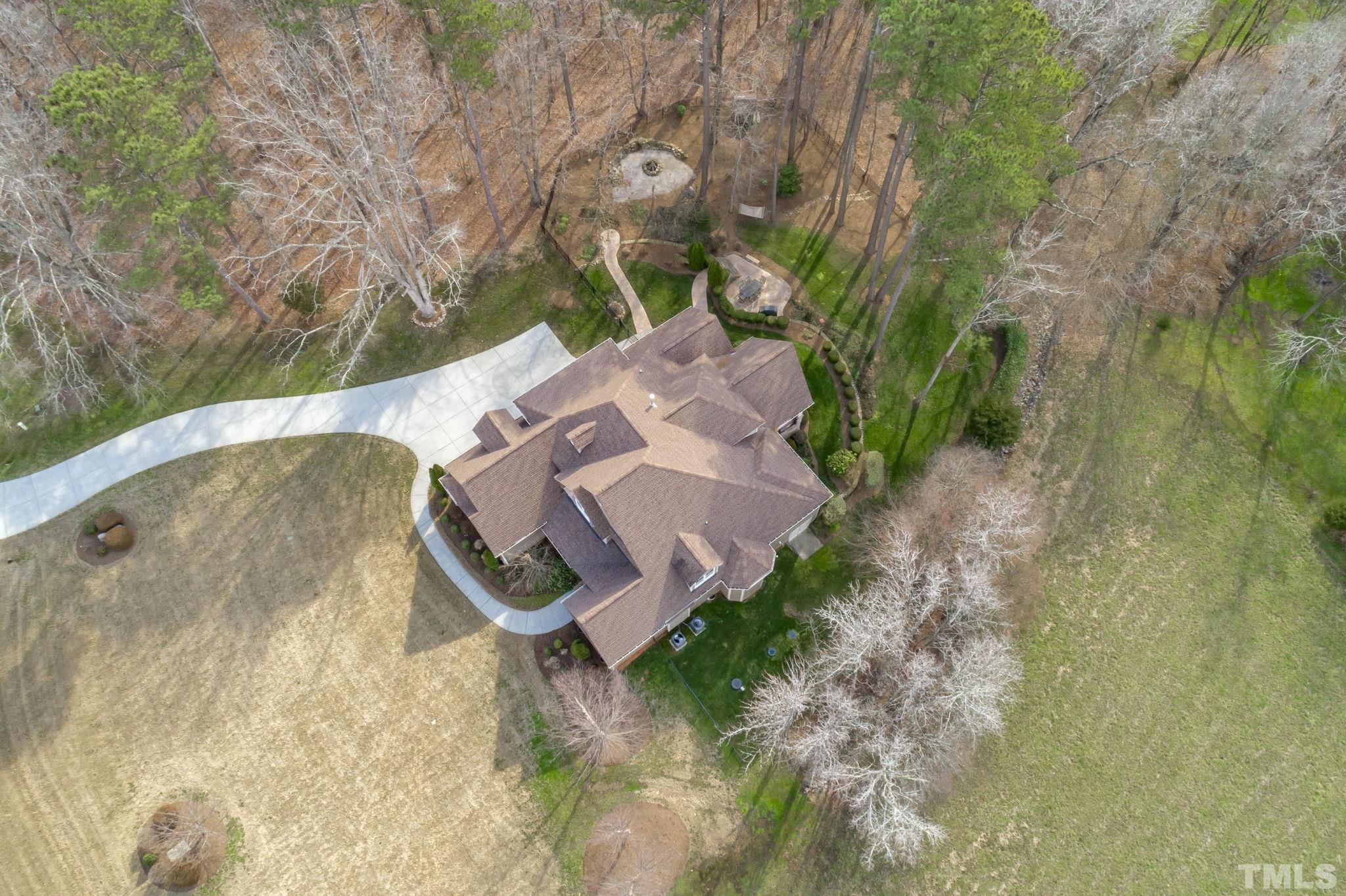 3976 Springfield Trail Wake Forest, NC 27587 - Photo 35 of 35 an aerial view of a house with yard and outdoor seating