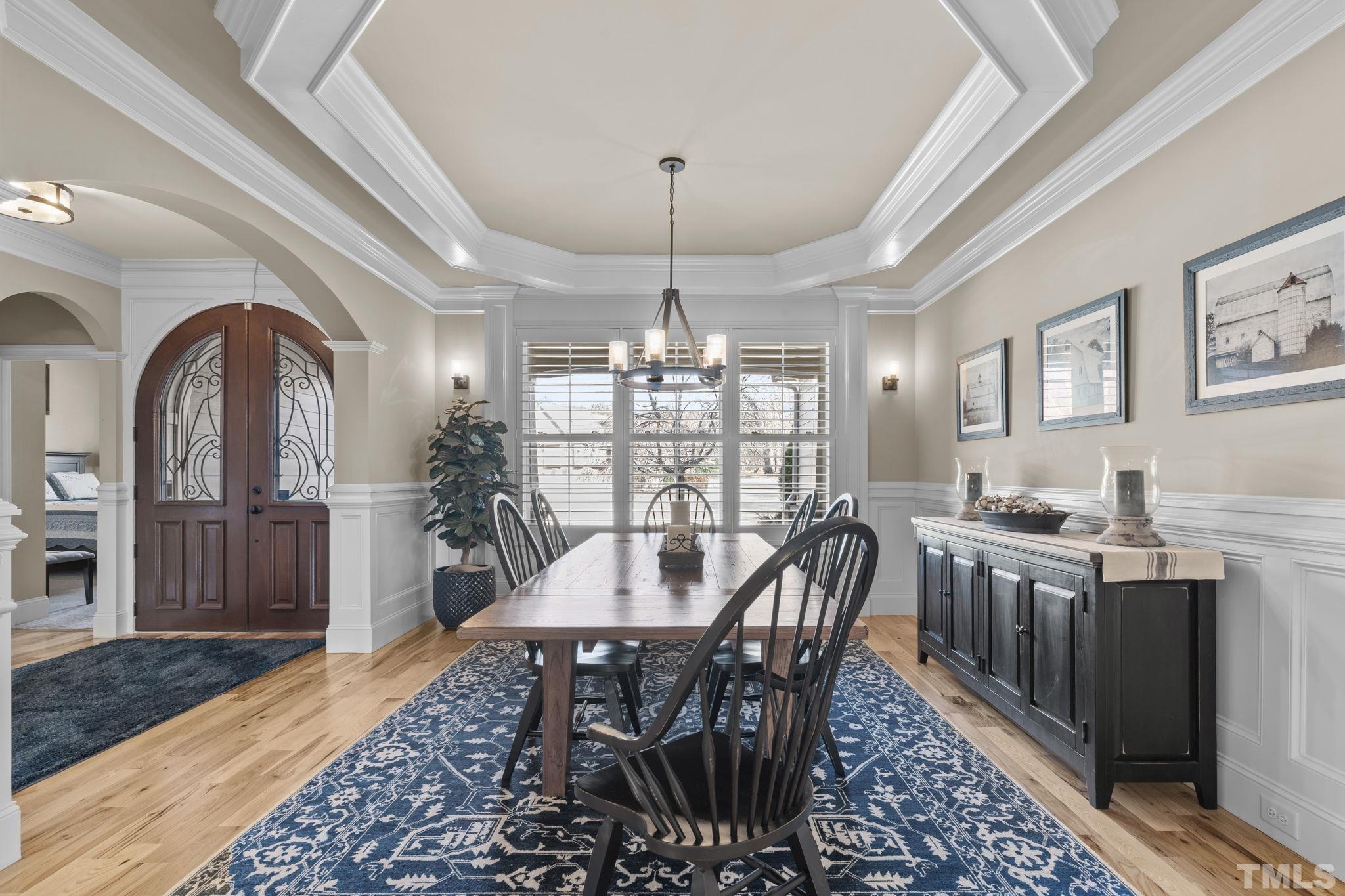 3976 Springfield Trail Wake Forest, NC 27587 - Photo 6 of 35 a view of a a dining room with furniture window and wooden floor