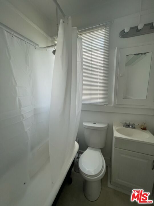 1304 Riviera Avenue, Unit D Venice, CA 90291 - Photo 14 of 17 a bathroom with a toilet sink and shower