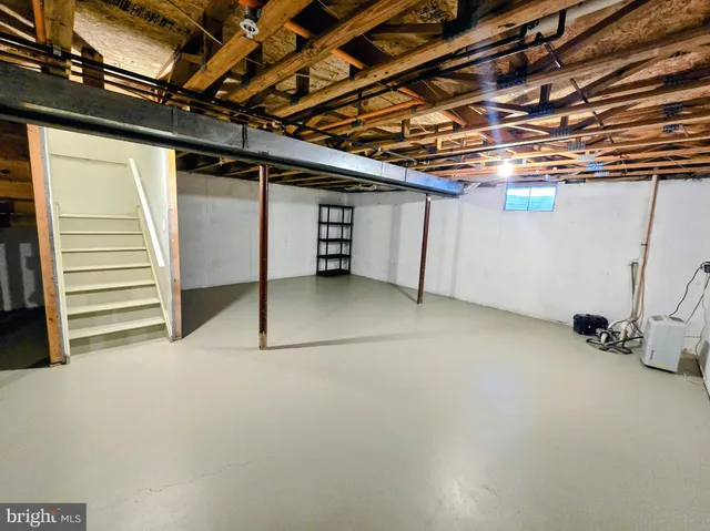 a view of a room with wooden walls