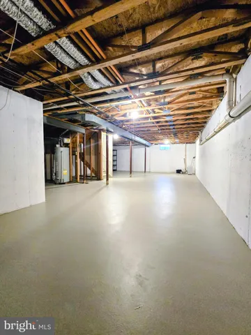 an outdoor sitting area with the couch and chairs