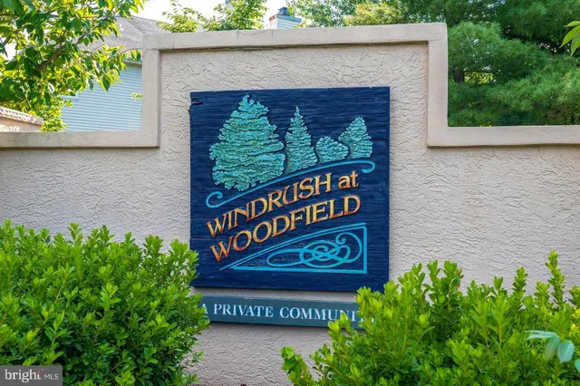 a view of a park with swings and slides