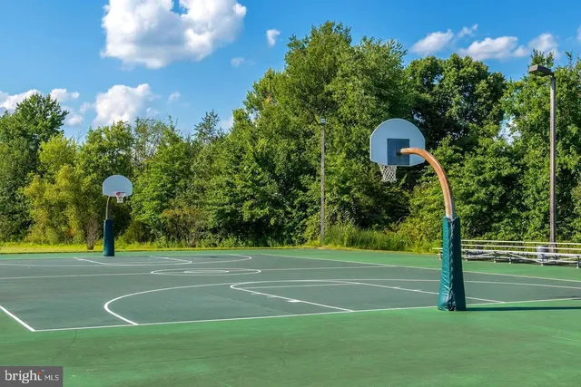 a view of a street with a building in the background