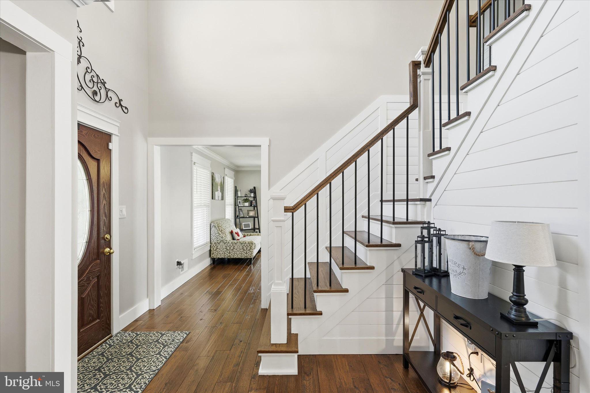 176 Warren Grove Road Barnegat, NJ 08005 - Photo 10 of 71 a view of entryway with wooden floor and stairs
