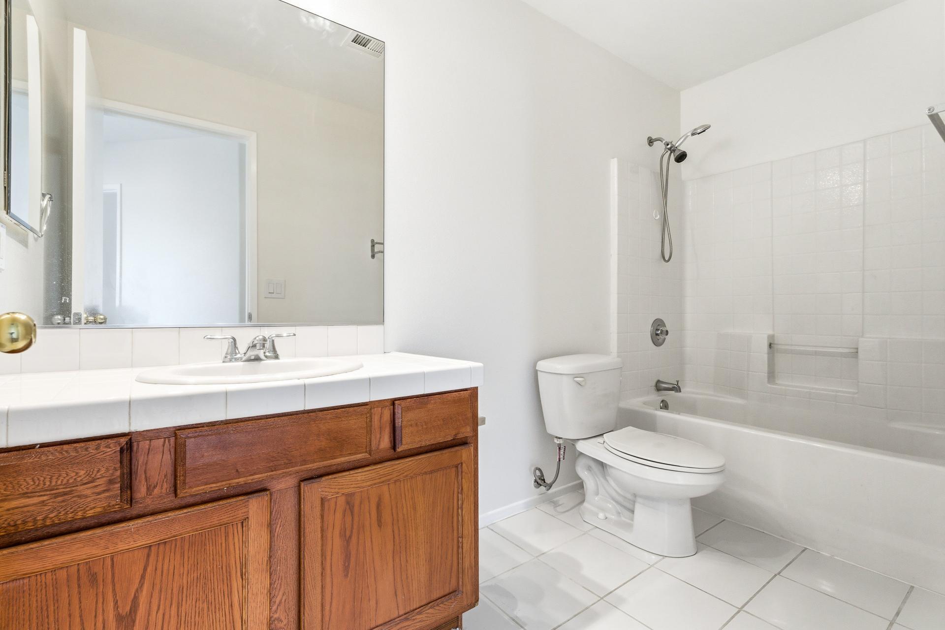 2776 Leto Avenue Thermal, CA 92274 - Photo 17 of 44 a bathroom with a sink toilet and shower