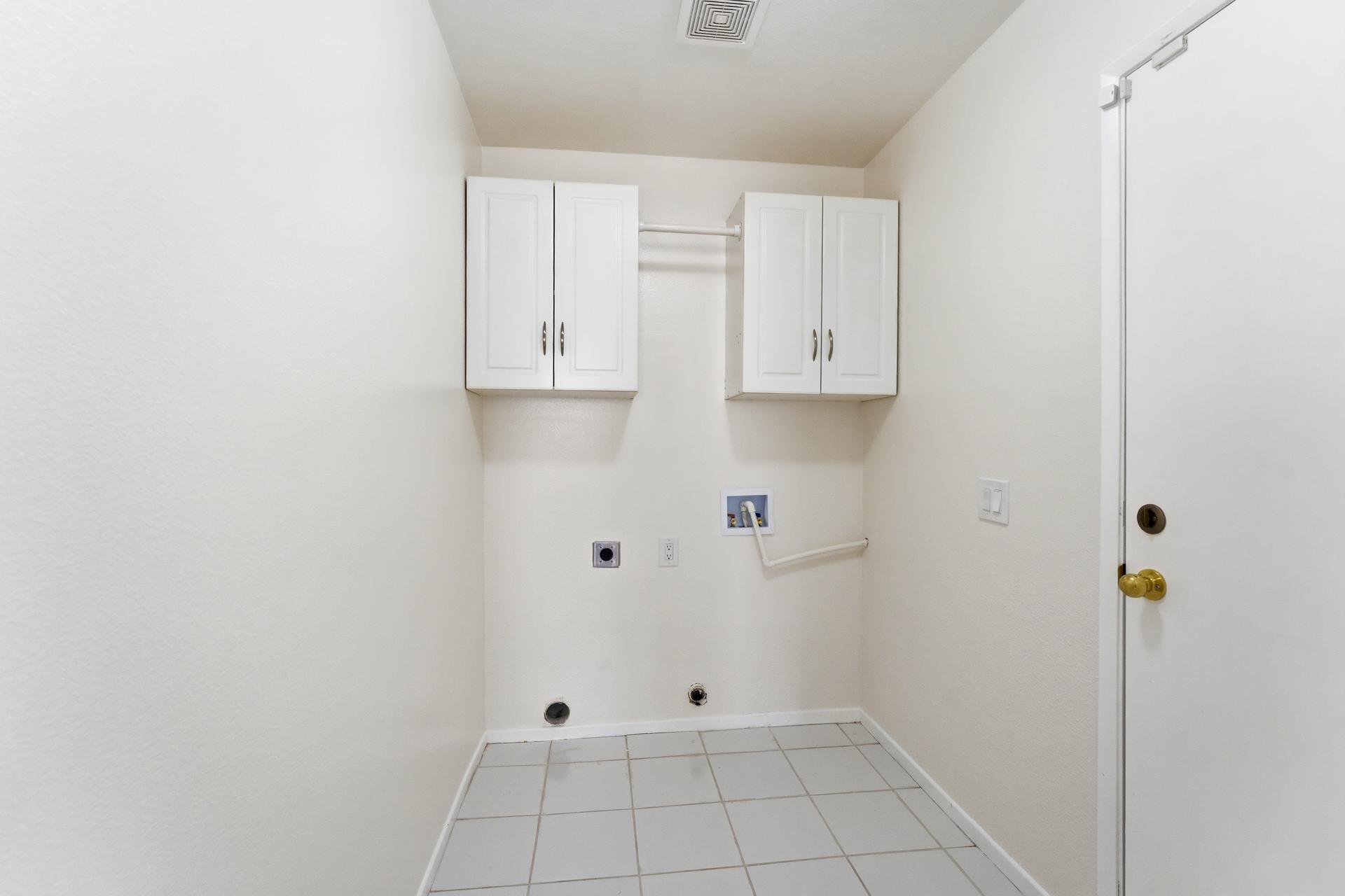 2776 Leto Avenue Thermal, CA 92274 - Photo 30 of 44 a view of kitchen with white cabinets