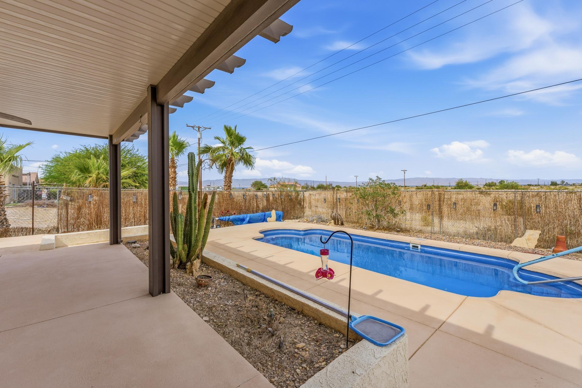2776 Leto Avenue Thermal, CA 92274 - Photo 33 of 44 a house view with swimming pool and sitting space
