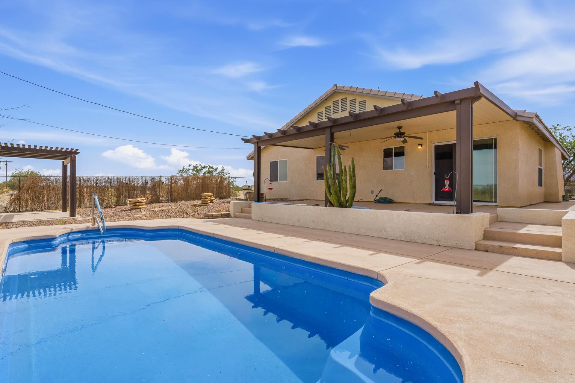 2776 Leto Avenue Thermal, CA 92274 - Photo 36 of 44 a view of a house with swimming pool