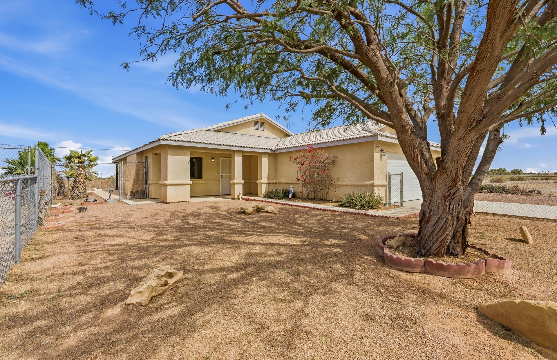 2776 Leto Avenue Thermal, CA 92274 - Photo 5 of 44 a big room with trees in front of it