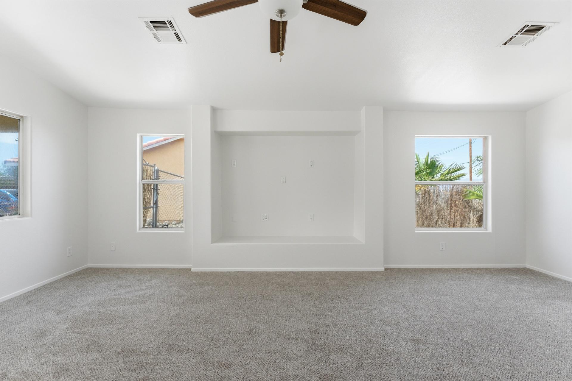 2776 Leto Avenue Thermal, CA 92274 - Photo 10 of 44 an empty room with windows