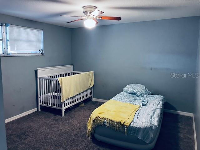 3841 Chaffey Drive New Port Richey, FL 34652 - Photo 11 of 18 a bedroom with 2 bed and a window