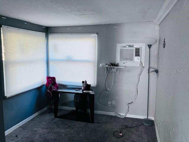 3841 Chaffey Drive New Port Richey, FL 34652 - Photo 14 of 18 a room with a table and a potted plant