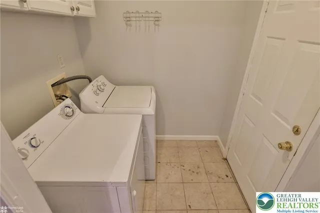 a view of room with window and wooden floor