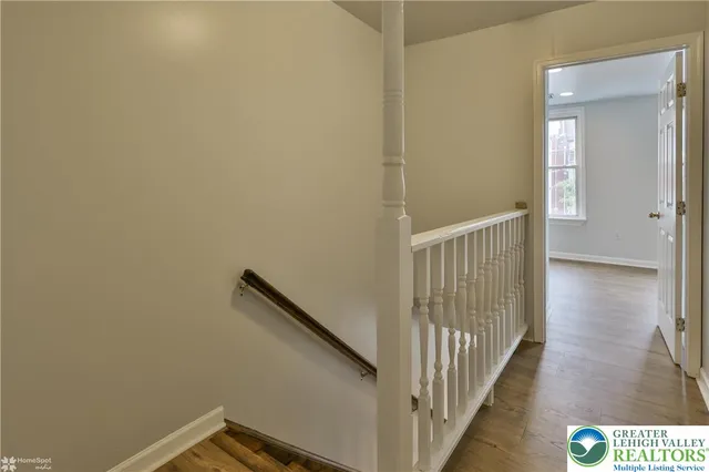 a bathroom with a bathtub toilet and a sink