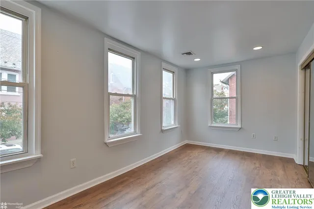 a view of a wooden roof deck