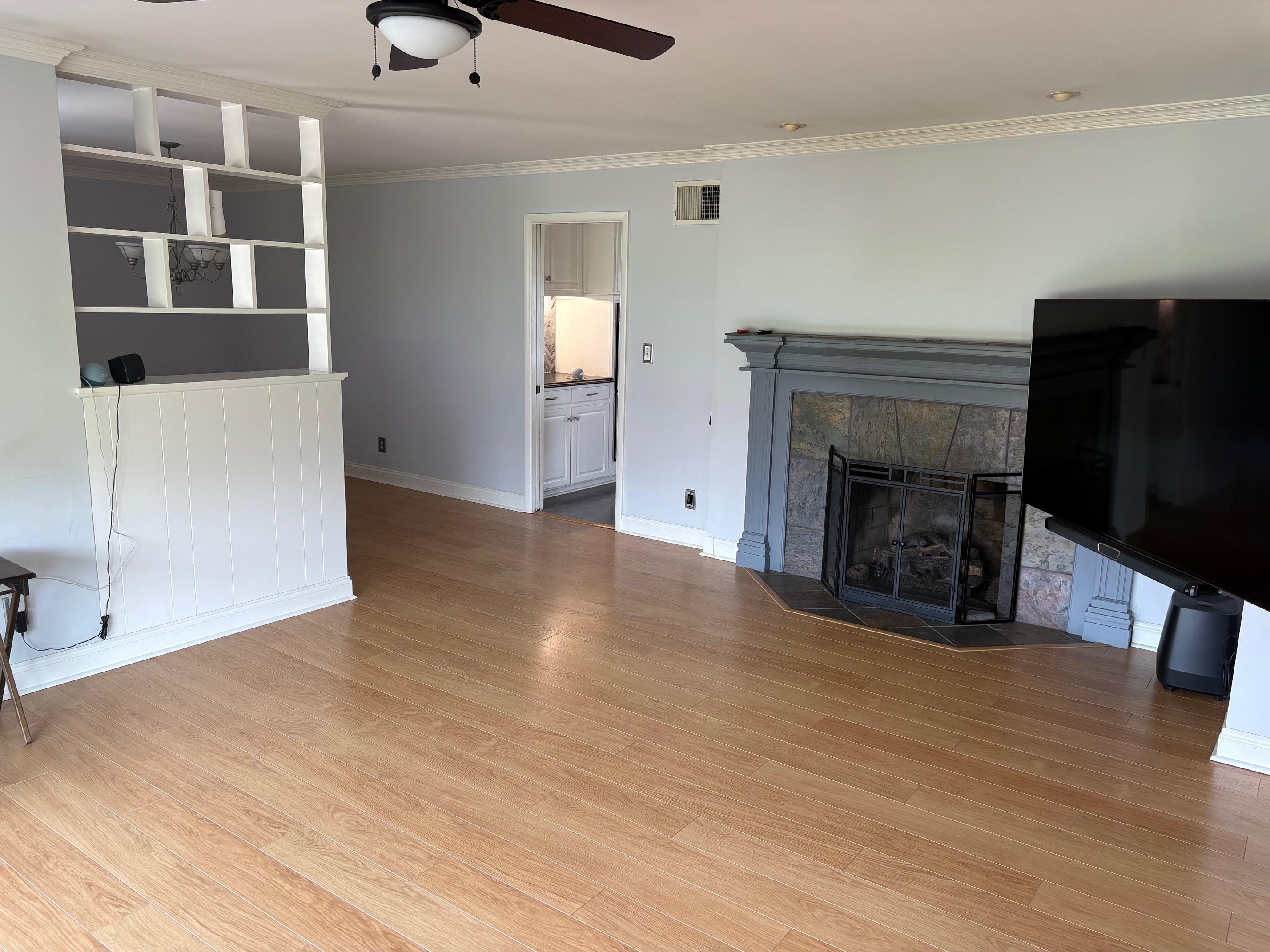 48 Confederate Street Verona, VA 24482 - Photo 7 of 47 wooden floor fireplace and windows in an empty room