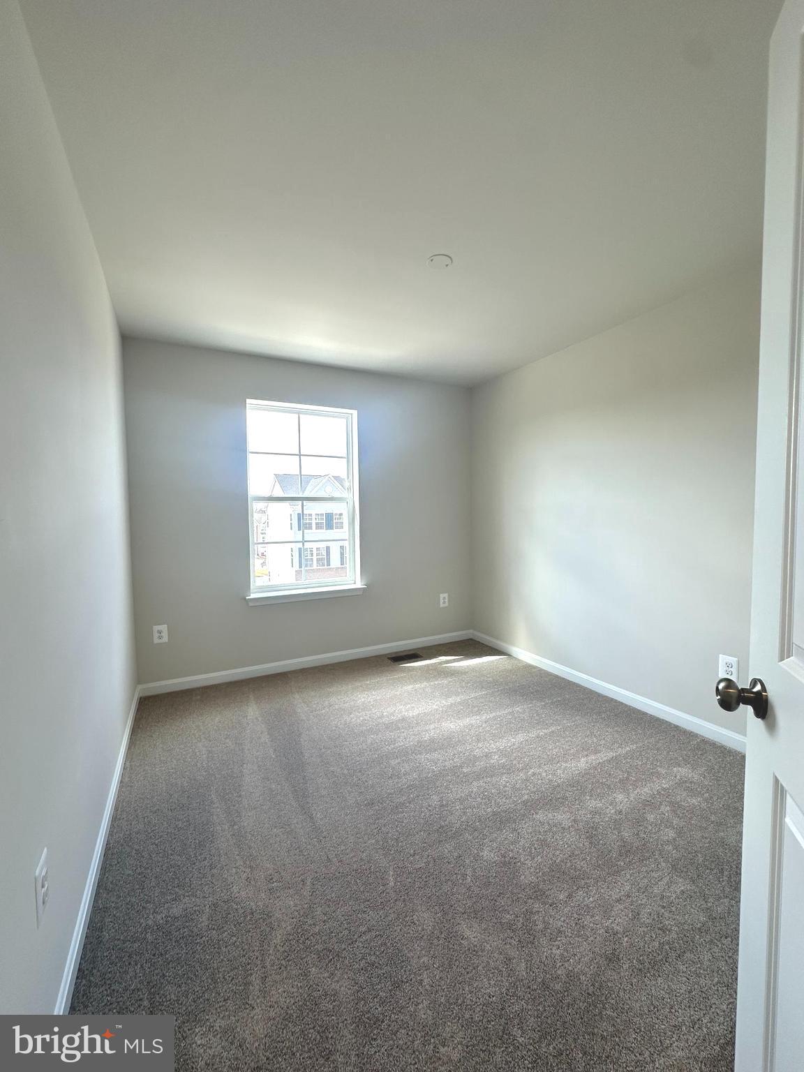 106 Telluride Way Charles Town, WV 25414 - Photo 26 of 55 an empty room with a window