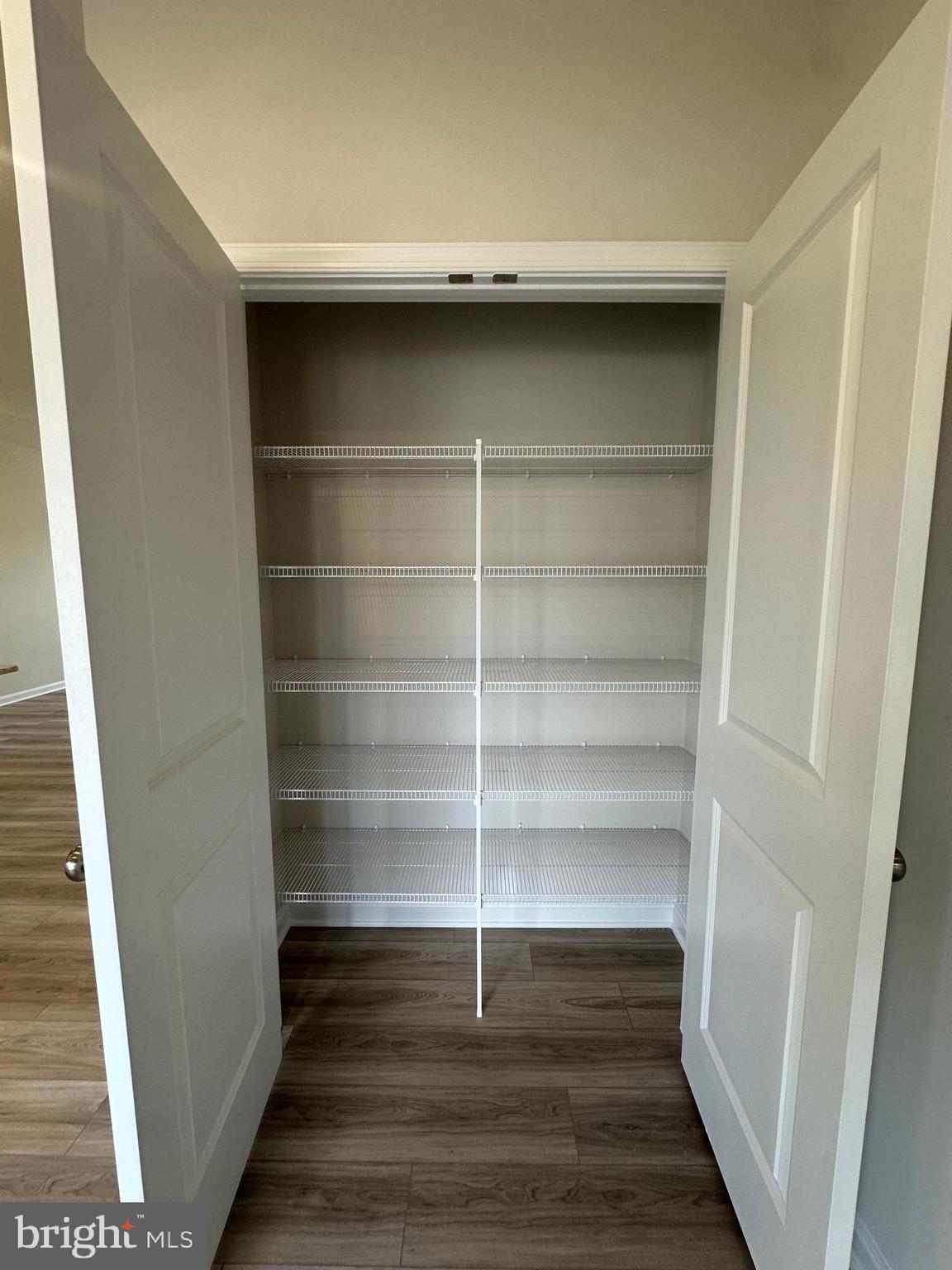 106 Telluride Way Charles Town, WV 25414 - Photo 34 of 55 a view of a room with wooden floor and door