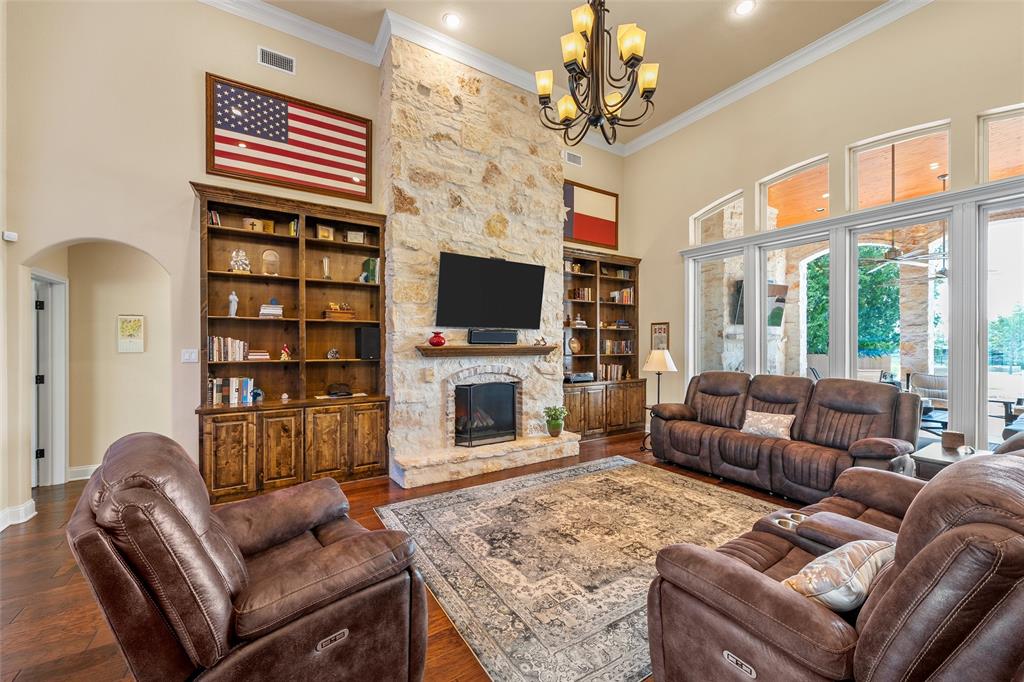 241 Chapman Road Hewitt, TX 76643 - Photo 4 of 40 Living area with gas fireplace