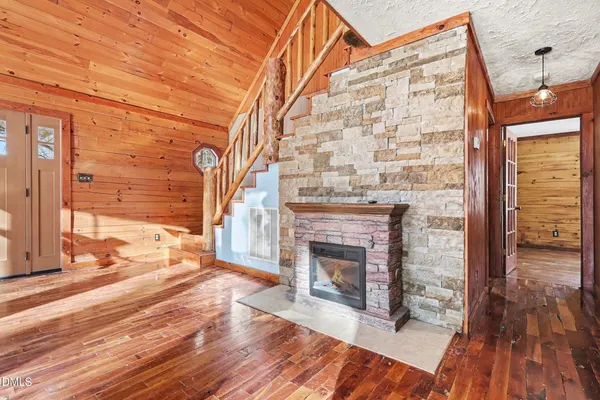 a view of balcony with wooden floor
