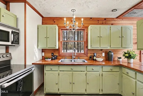 a bathroom with a double vanity sink and mirror