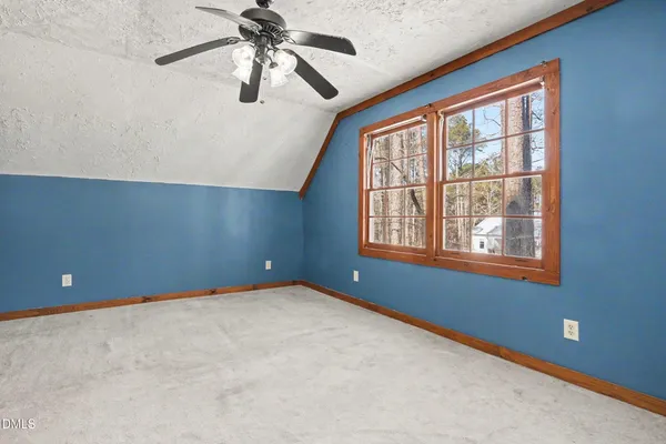 a view of a balcony with wooden floor