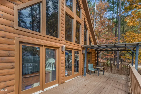 a view of balcony with wooden floor
