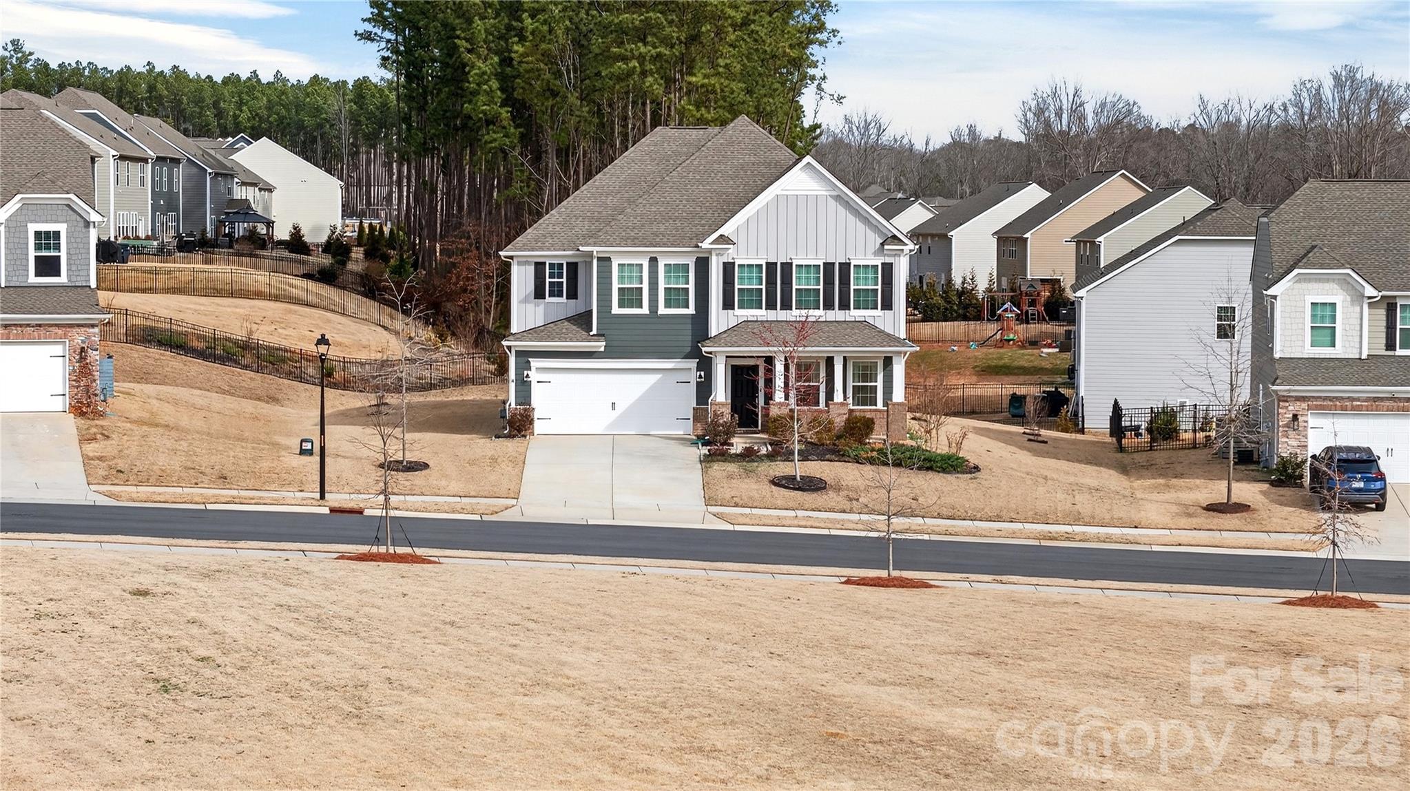 151 Outrigger Lane Troutman, NC 28166 - Photo 2 of 39 a front view of a house with a yard