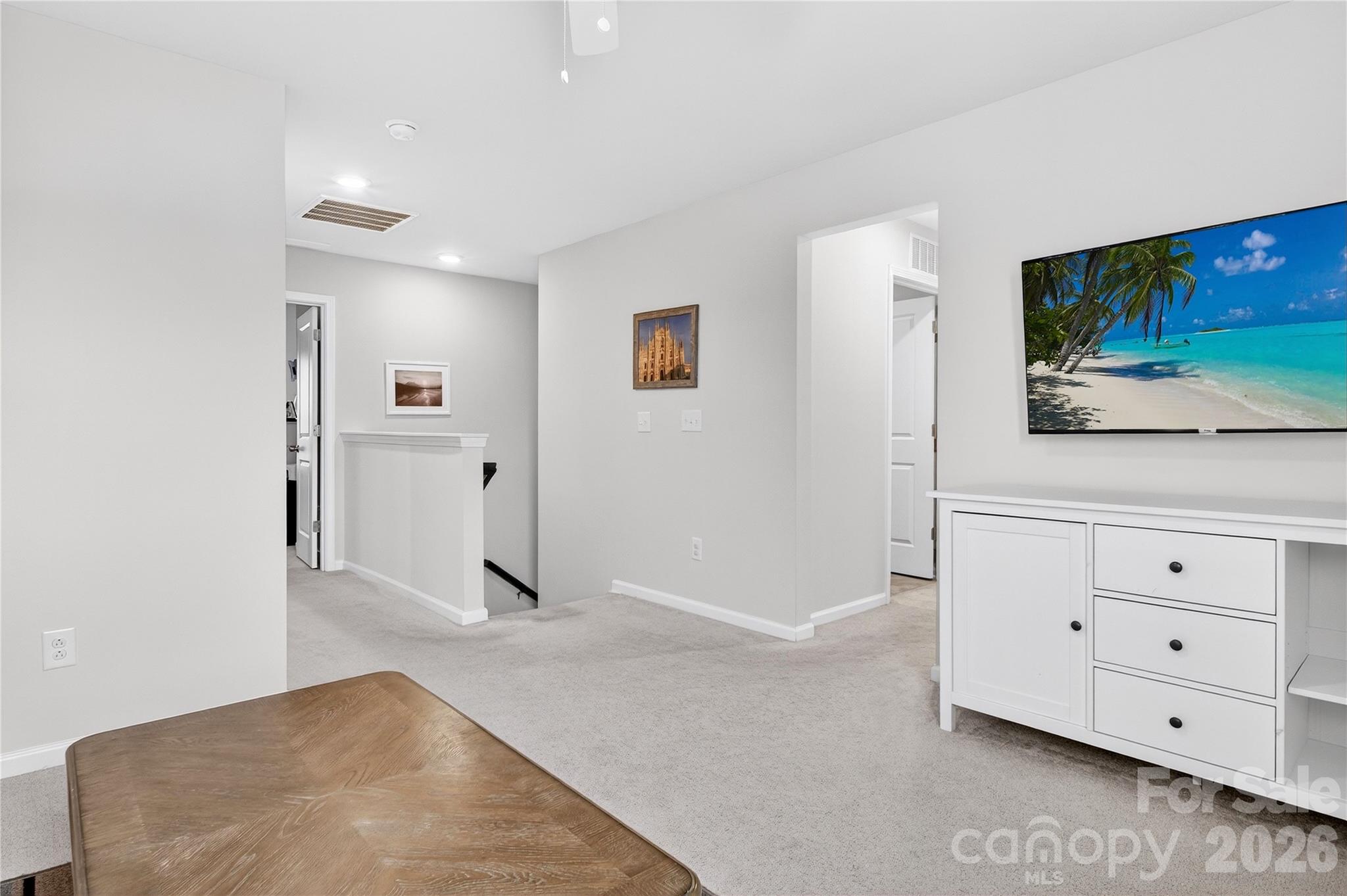 151 Outrigger Lane Troutman, NC 28166 - Photo 23 of 39 wooden floor with white walls