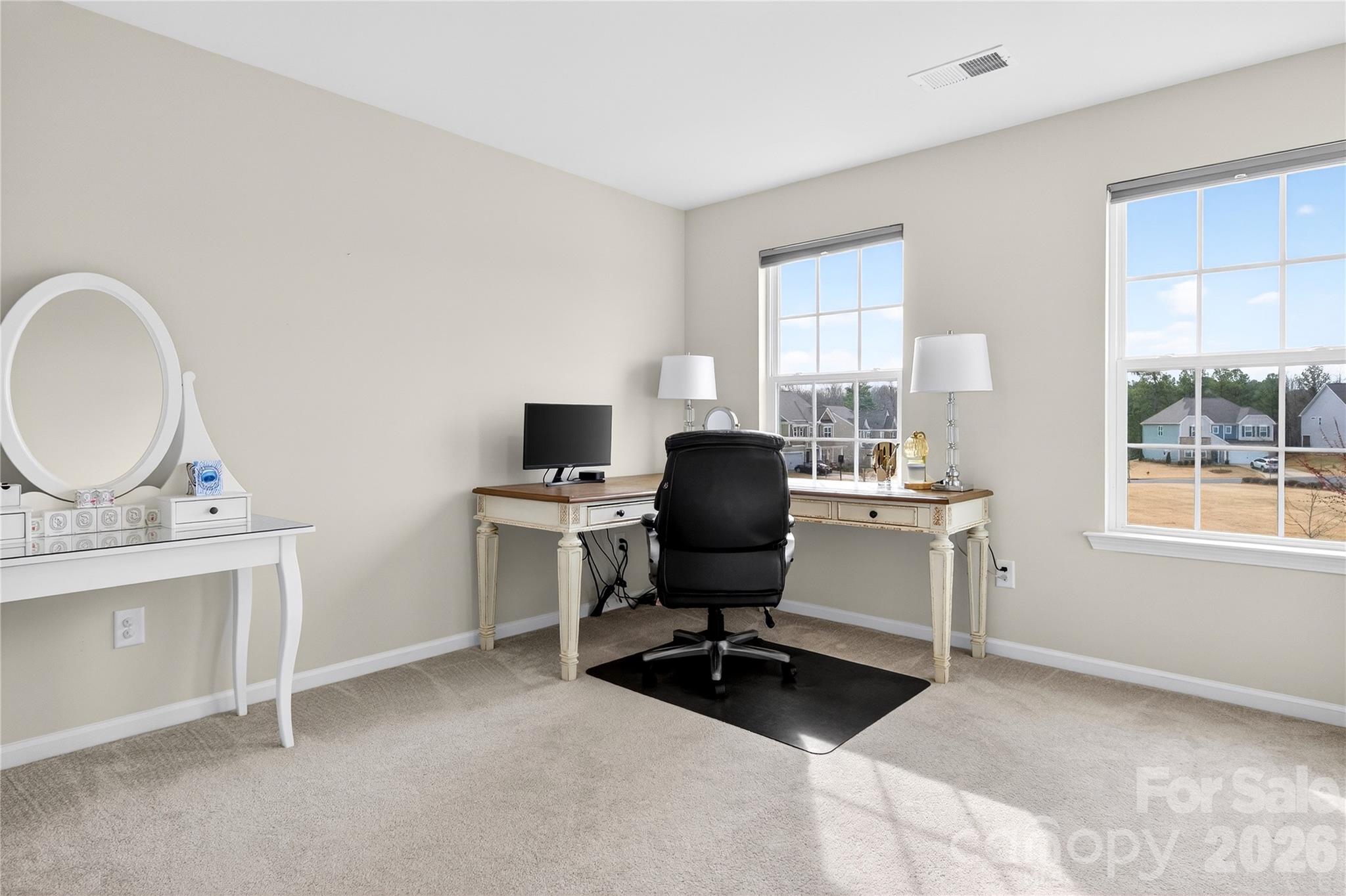 151 Outrigger Lane Troutman, NC 28166 - Photo 28 of 39 a view of a workspace with furniture and a window