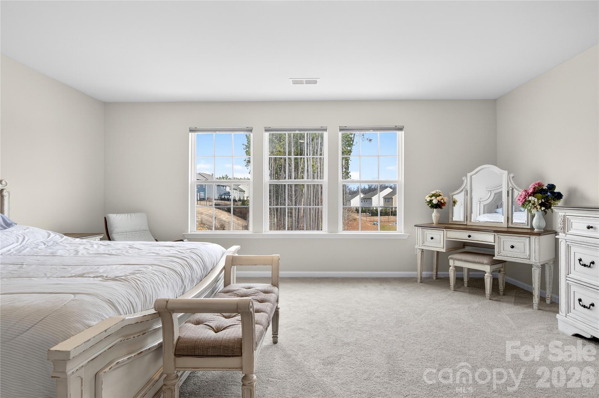 151 Outrigger Lane Troutman, NC 28166 - Photo 31 of 39 a bedroom with furniture and a window