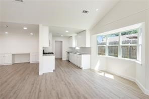 4715 Broken Elm Drive Spring, TX 77388 - Photo 16 of 35 a view of kitchen with wooden floor and electronic appliances