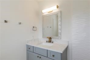 4715 Broken Elm Drive Spring, TX 77388 - Photo 27 of 35 a bathroom with a sink a toilet and mirror