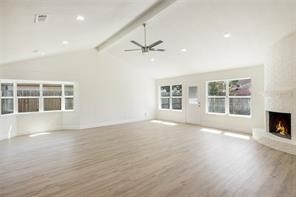 4715 Broken Elm Drive Spring, TX 77388 - Photo 9 of 35 a view of an empty room with a window and fireplace
