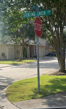 a view of a swimming pool with a backyard
