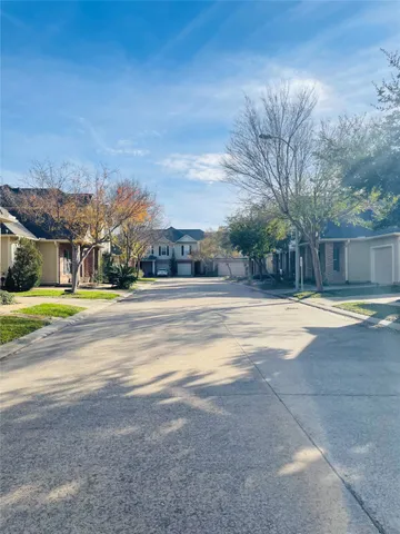 a view of the house with a swimming pool