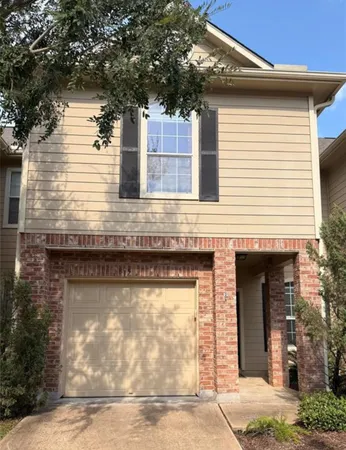 a view of house with outdoor space