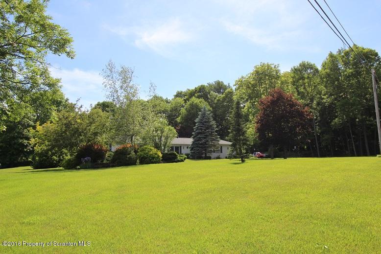 1620 Cortez Road Lake Ariel, PA 18436 - Photo 11 of 80 a view of swimming pool with an outdoor space and seating area