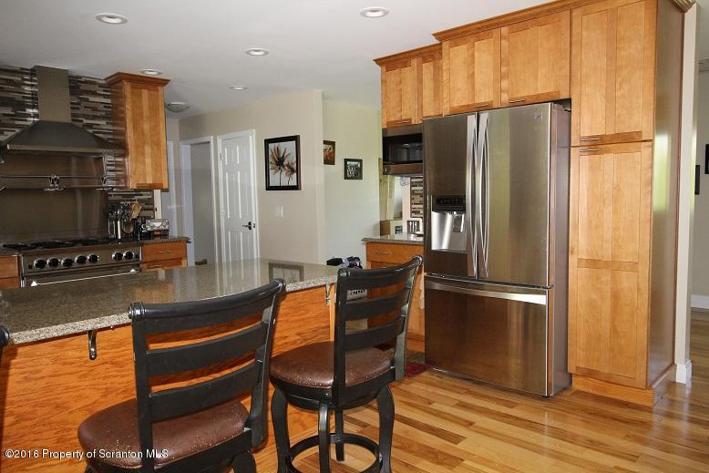 1620 Cortez Road Lake Ariel, PA 18436 - Photo 21 of 80 a kitchen with stainless steel appliances granite countertop a refrigerator and a stove top oven
