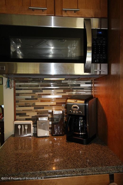 1620 Cortez Road Lake Ariel, PA 18436 - Photo 24 of 80 a stove top oven sitting inside of a kitchen