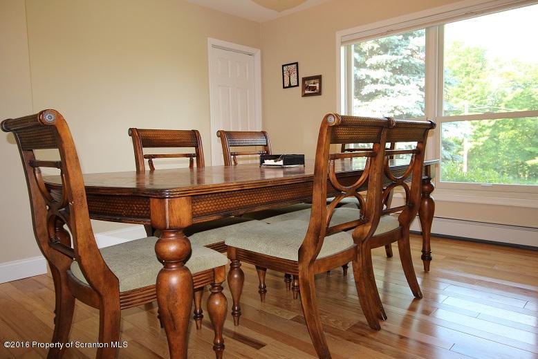 1620 Cortez Road Lake Ariel, PA 18436 - Photo 25 of 80 a dining room with furniture and wooden floor