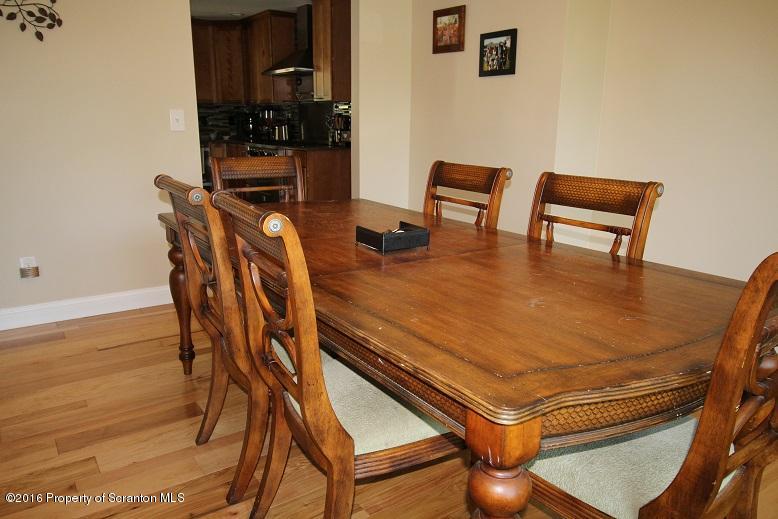 1620 Cortez Road Lake Ariel, PA 18436 - Photo 28 of 80 a dining room with furniture and wooden floor